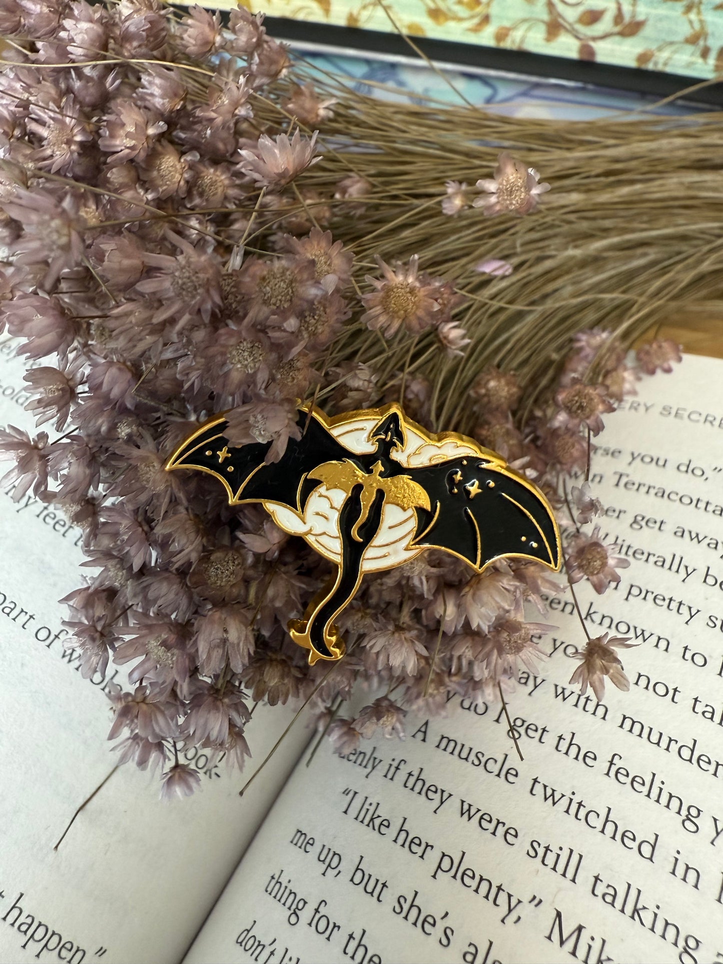 Gold and black pin dragon