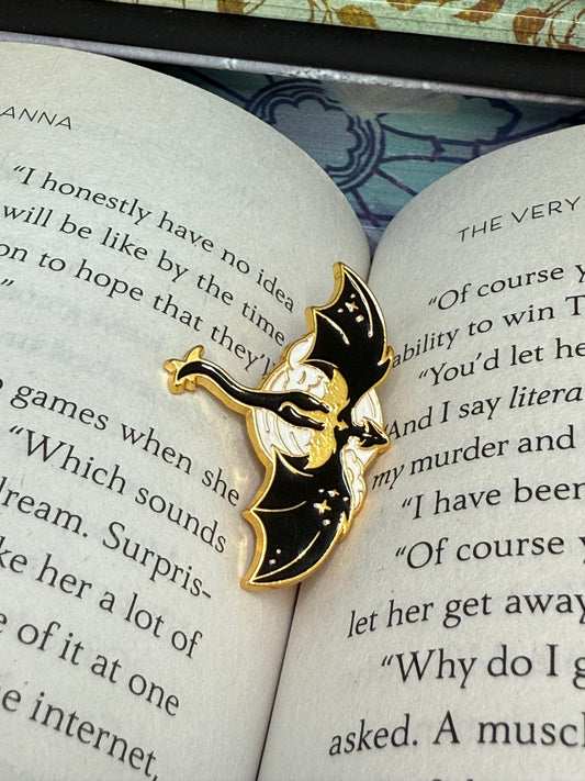 Gold and black pin dragon