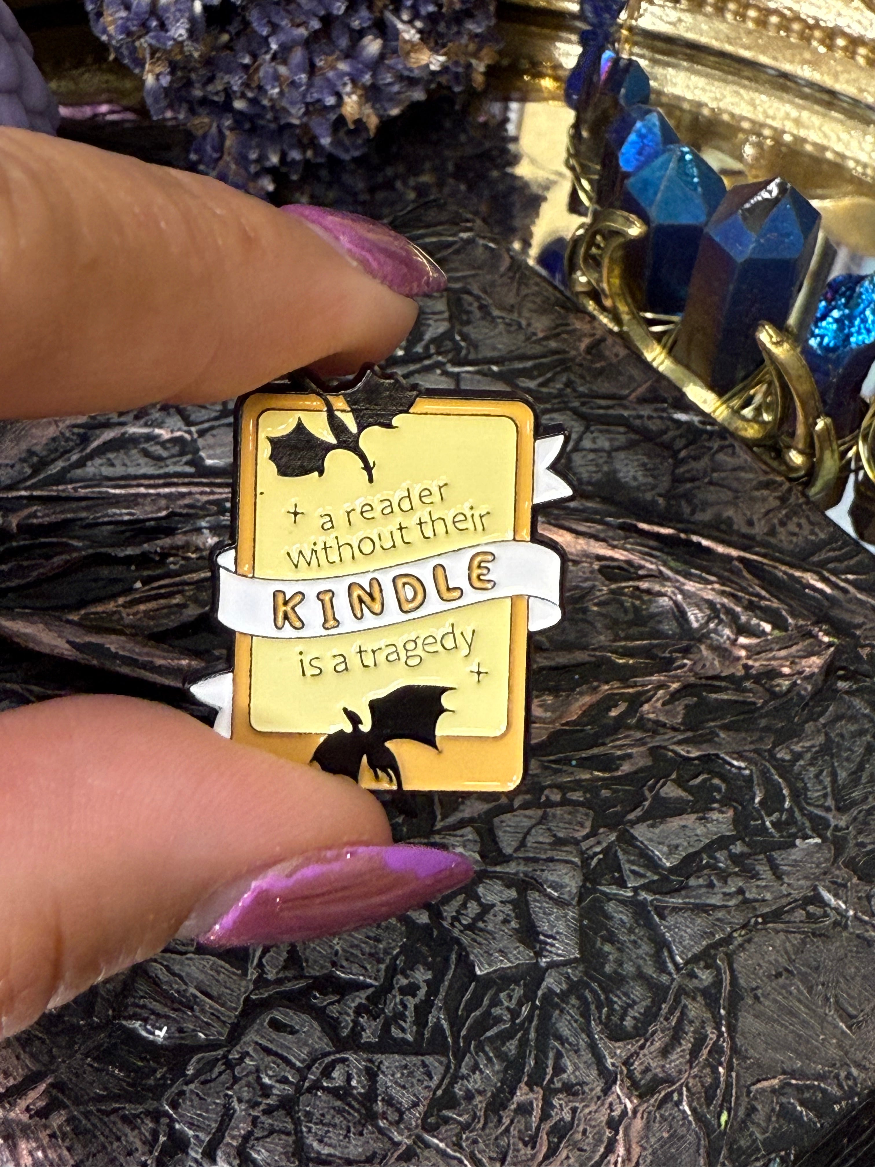 A reader without their kindle is a tragedy pin