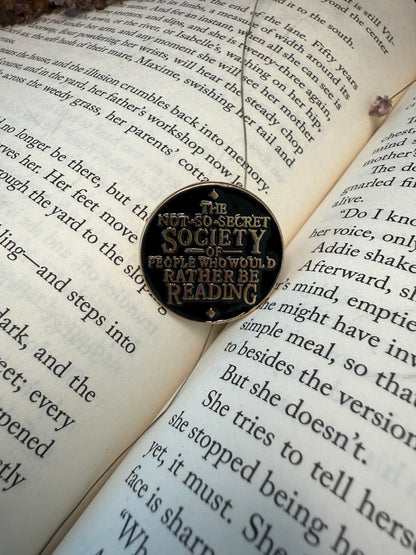 The not so secret society of people who would rather be reading. Enamel pin