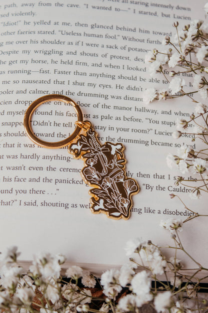 Ivory Sword Fantasy Reader Enamel Keychain